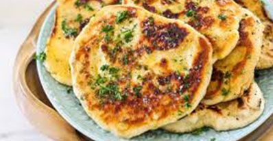 The Real Food Academy Orlando fresh garlic naan bread.