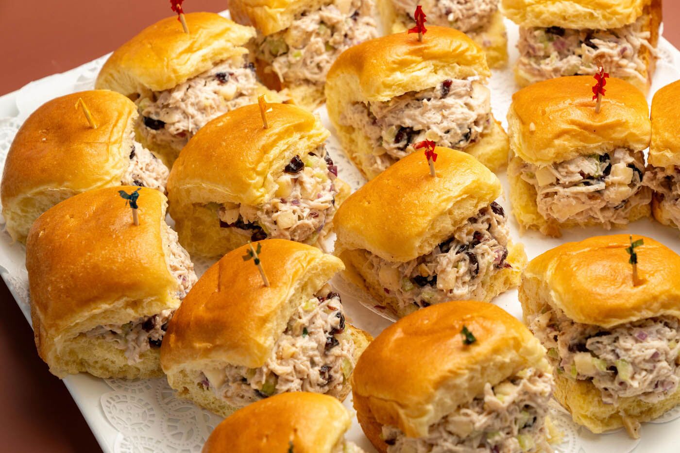 Chicken sandwiches in little buns at The Real Food Academy Miami.