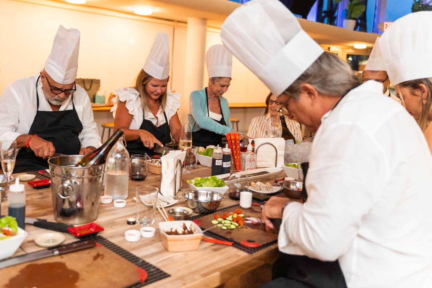 A corporate team at The Real Food Academy participating in the ultimate Miami corporate experience.