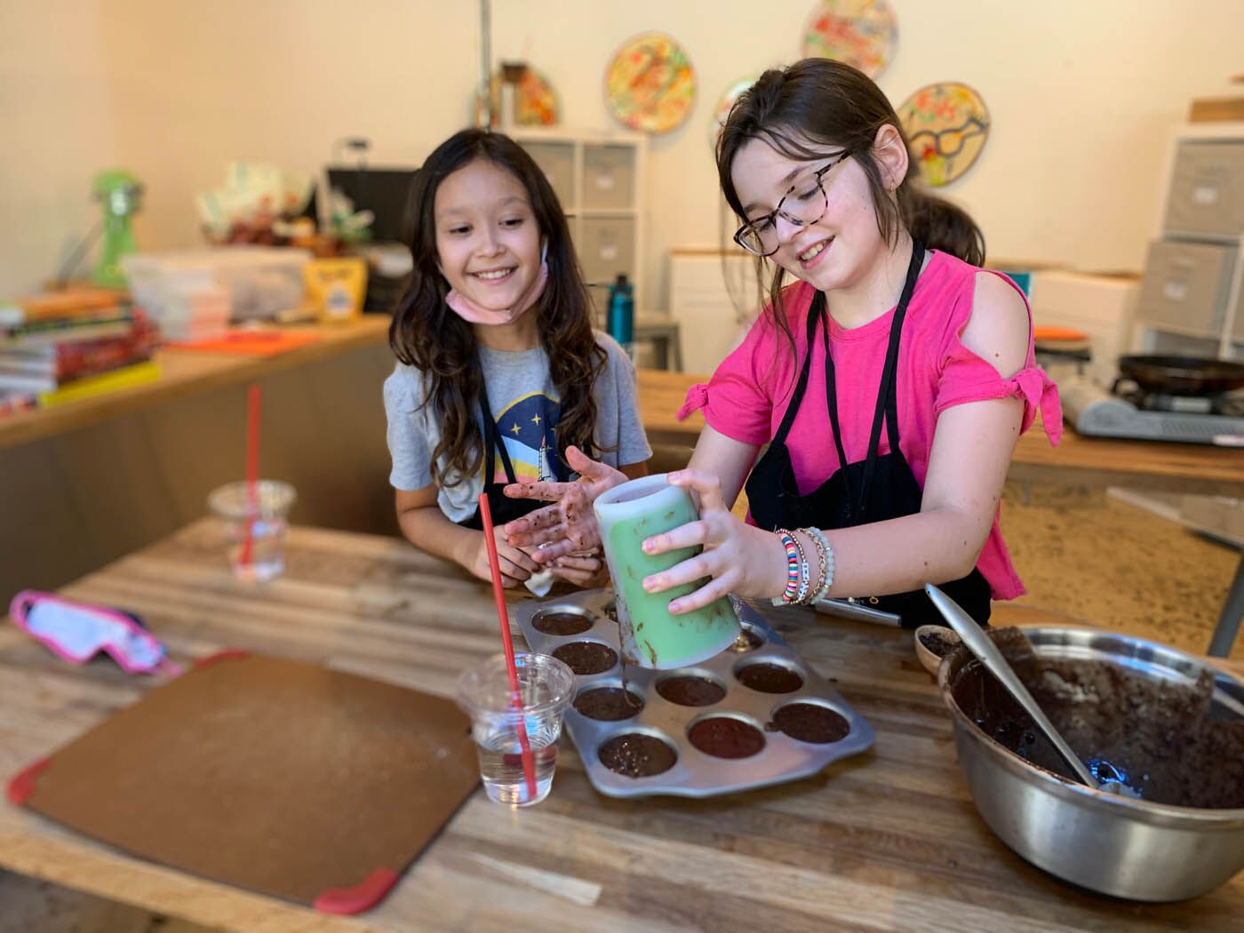 Two little girls making healthy brownies at The Real Food Academy Orlando's after school program.