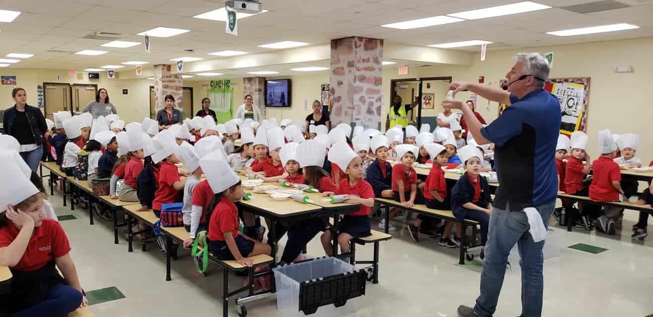 Owner Arthur Cummins leading a cooking field trip in Miami, FL.
