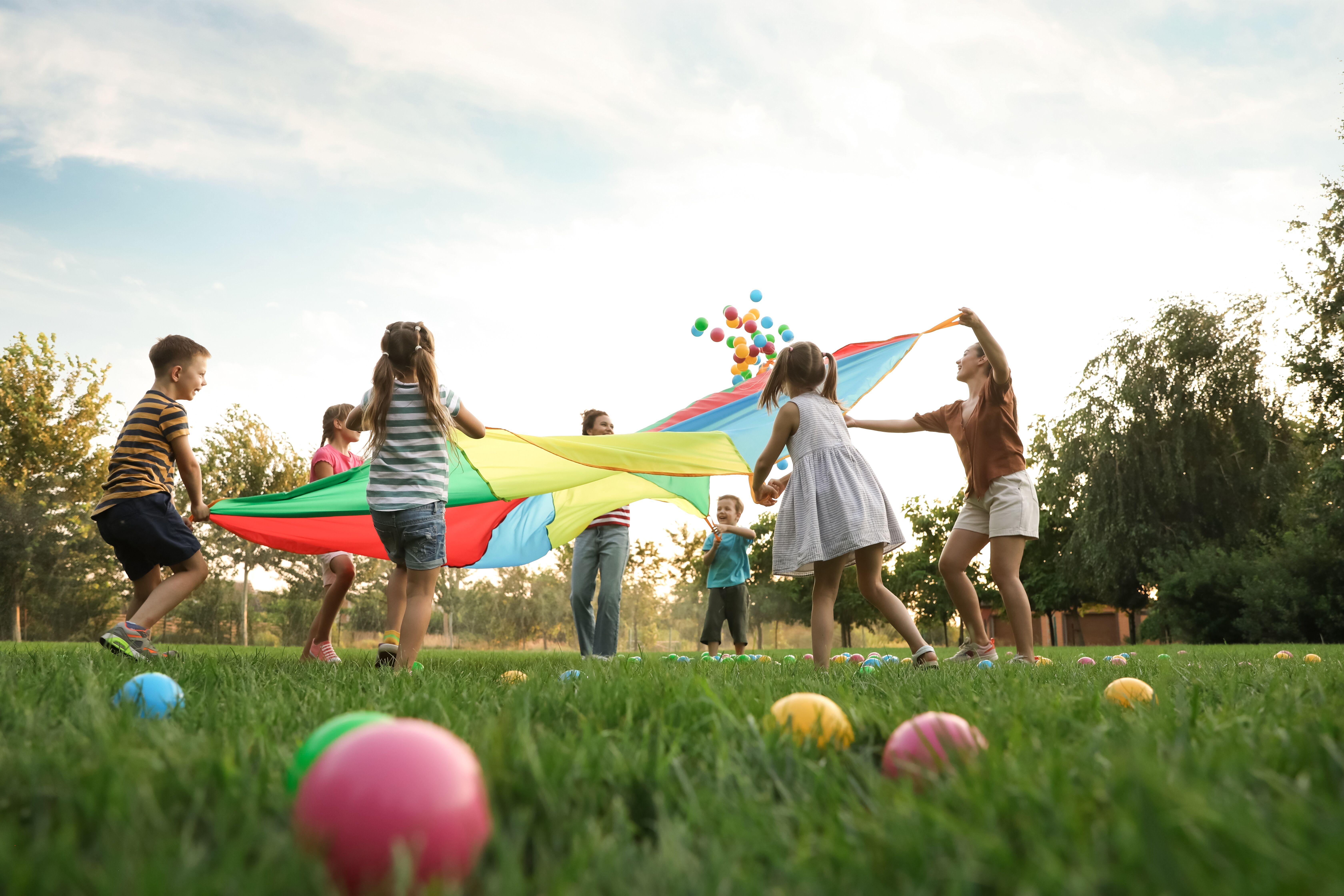 A group of kids having fun at a sports themed party, inspired by The Real Food Academy.