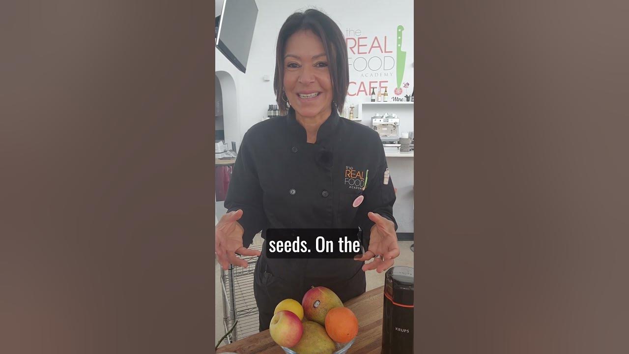 The Real Food Academy Miami Head Chef Maria teaching a trip to mumbai recipe.