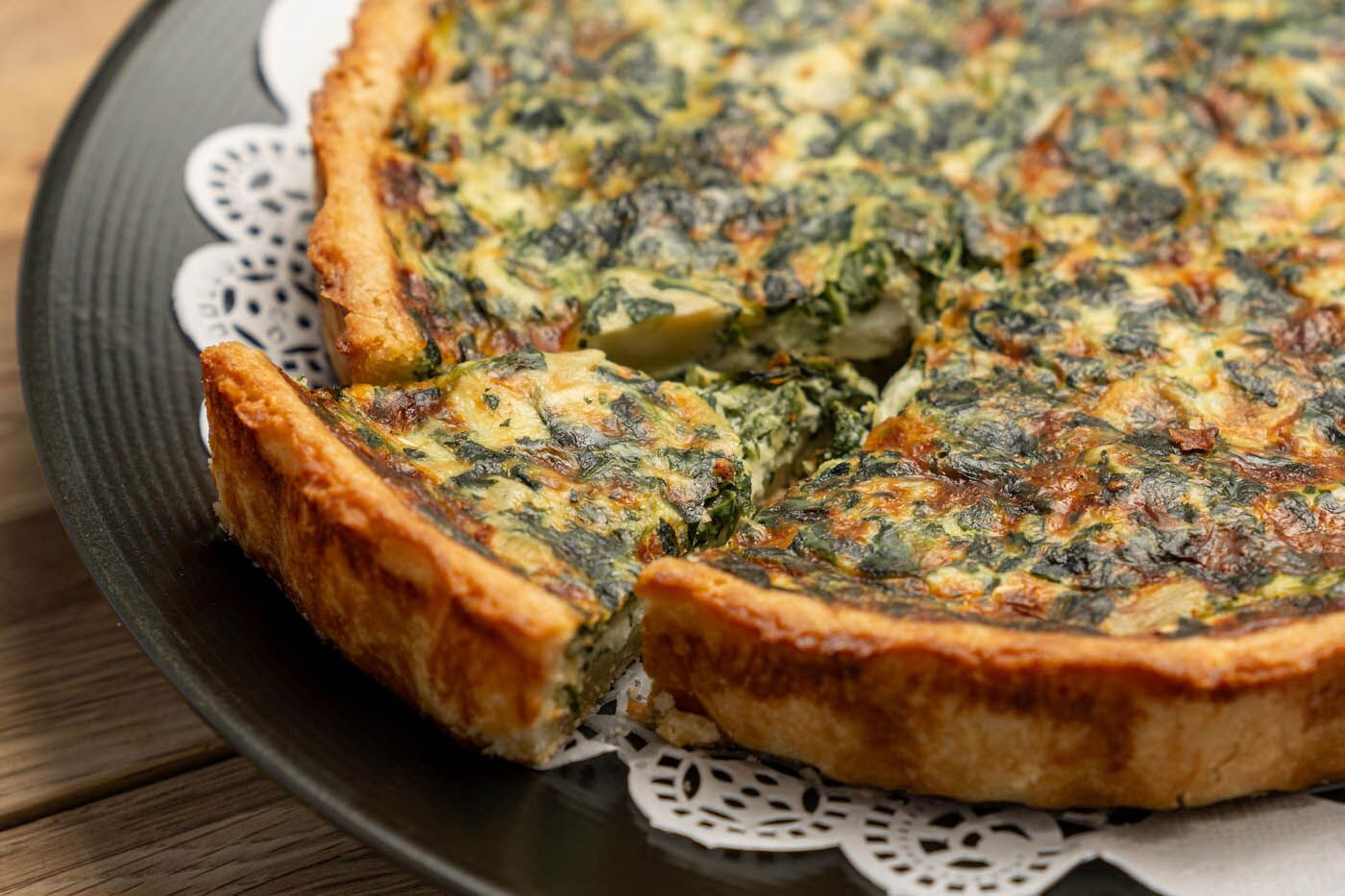 Quiche on a white plate at The Real Food Academy Miami.
