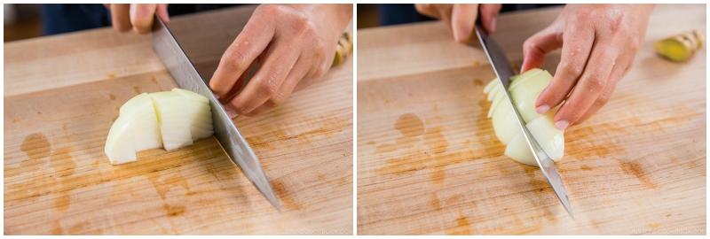 An picture of a chef from The Real Food Academy chopping an onion.