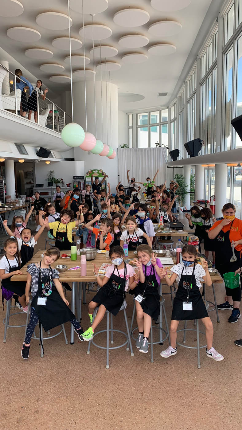 A group of kids at The Real Food Academy Miami, contact us for field trip ideas in Miami, FL today.